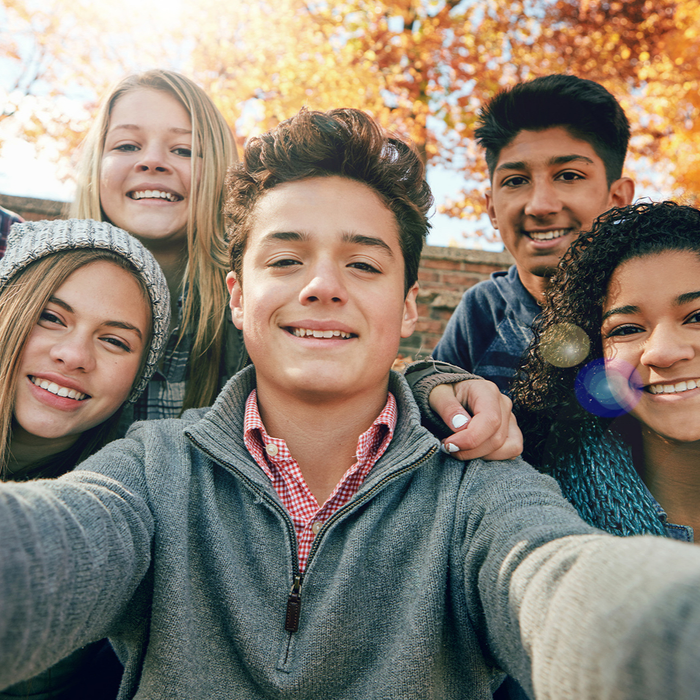 teens taking selfie